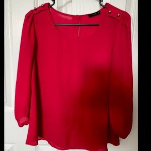 Red professional top with gold decorative buttons